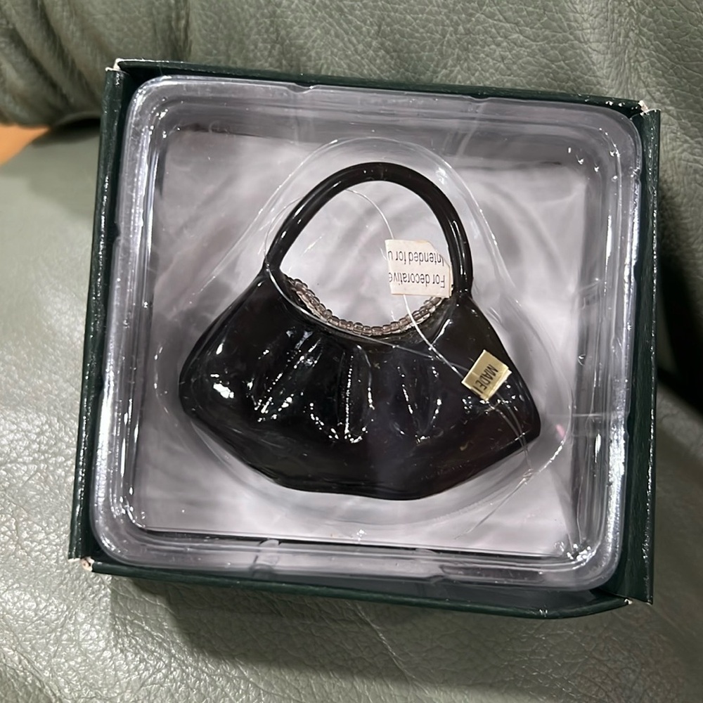 Marshall Field’s glass black purse ornament. In orig packaging.